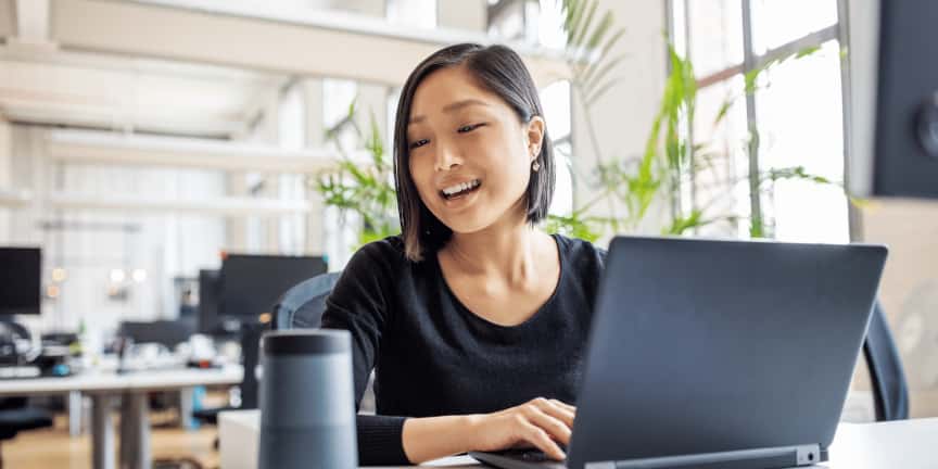 a virtual assistant working with her laptop